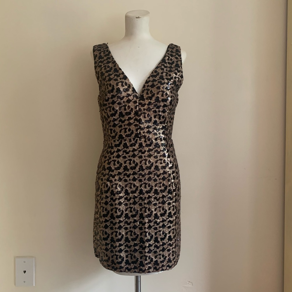 Black and gold sequin dress